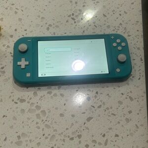 TURQUOISE NINTENDO SWITCH LITE WITH CASE